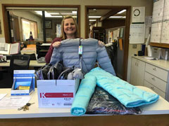 EDCOE delivers boxes of winter coats to schools across the county to keep children in need warm this winter.